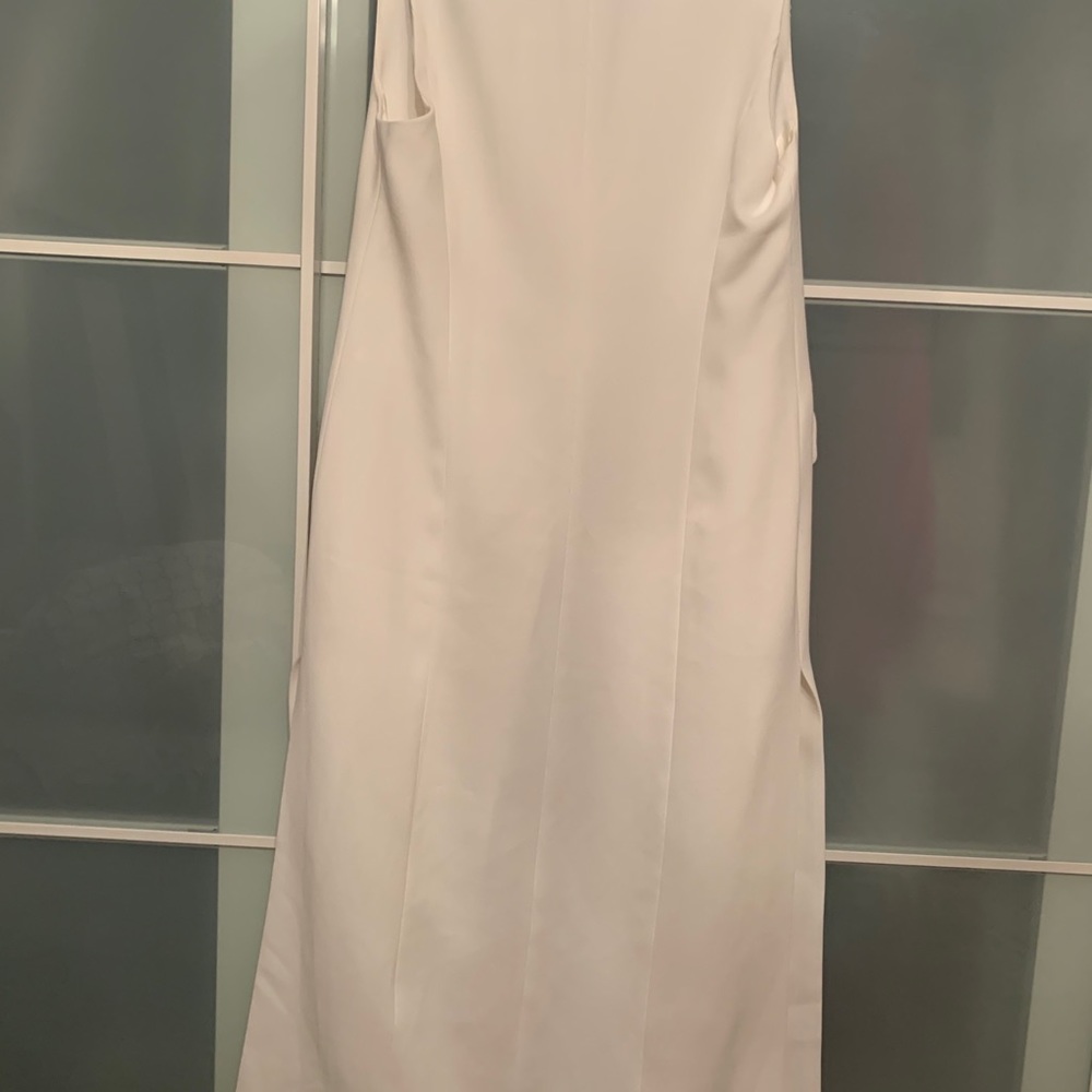 - White Zara long vest.